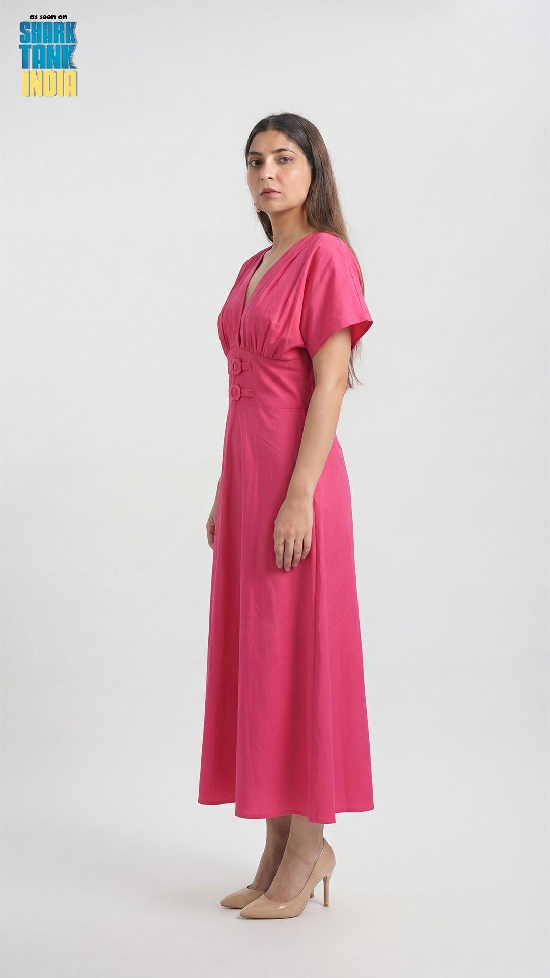 Woman wearing a pink dress on a white background