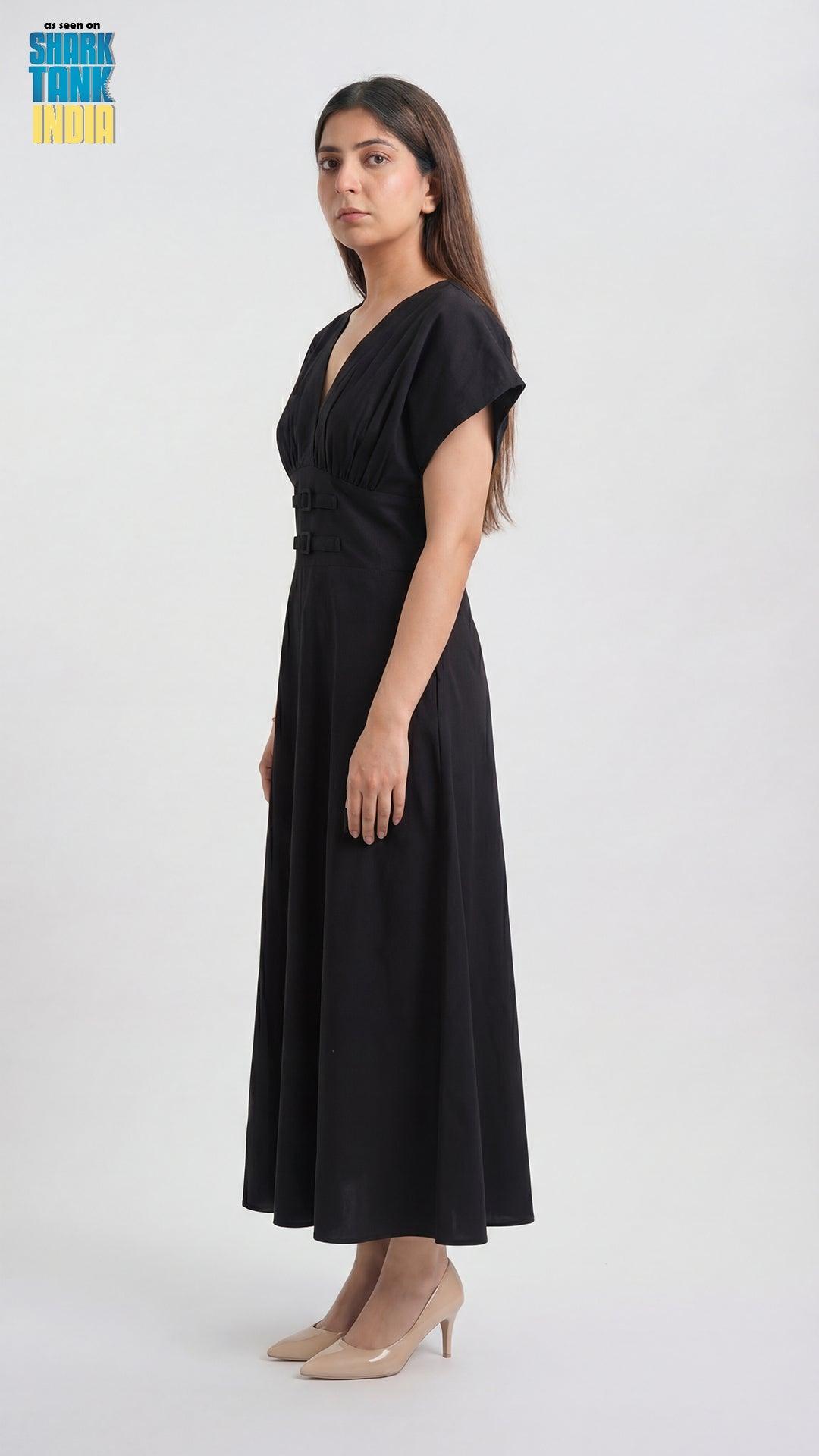 Woman wearing a black dress on a white background