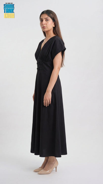 Woman wearing a black dress on a white background