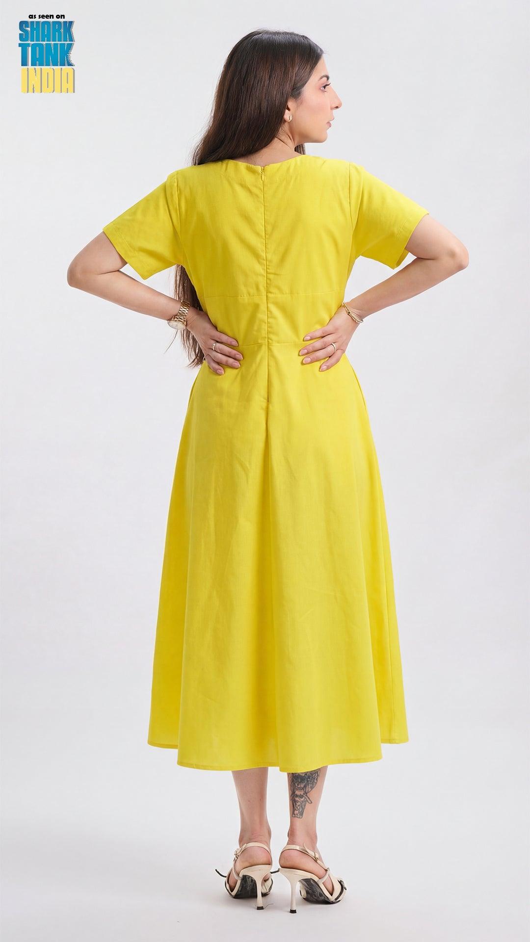Woman wearing a yellow dress on a white background