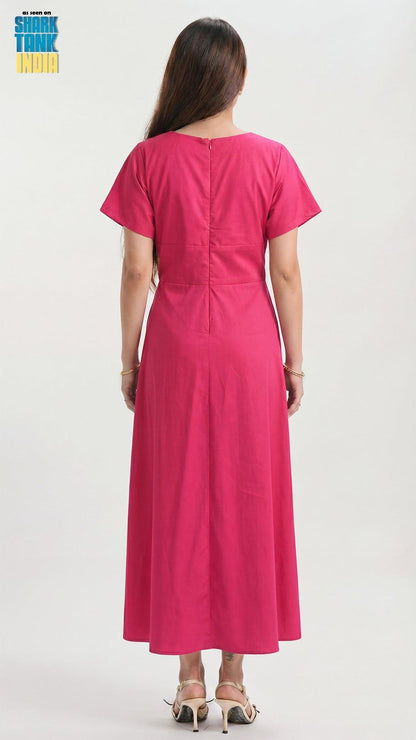 Woman wearing a pink dress from behind on a white background
