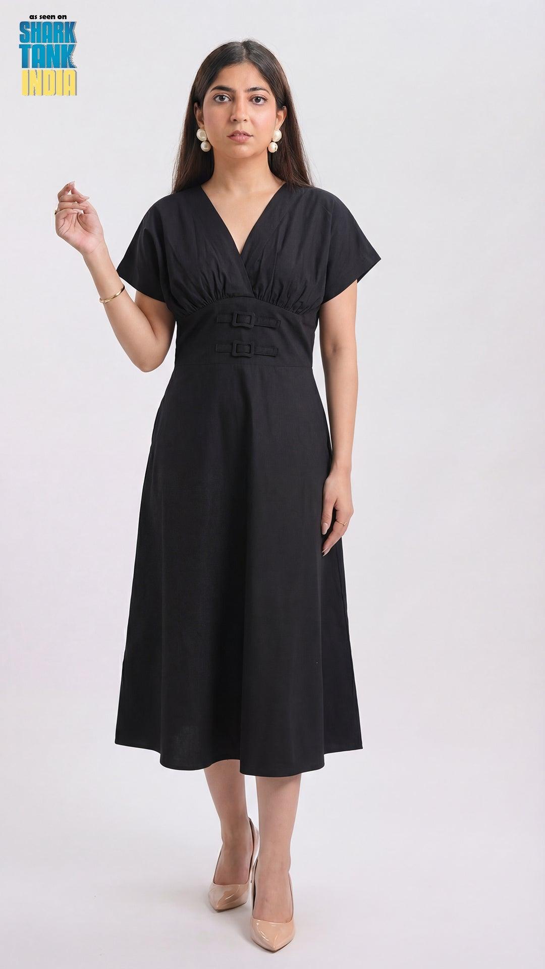 Woman wearing a black dress on a white background